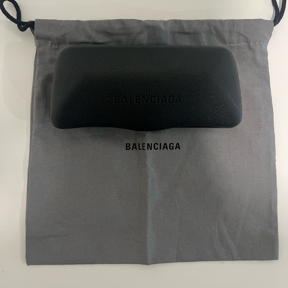 Balanciaga sunglasses case and duster bag